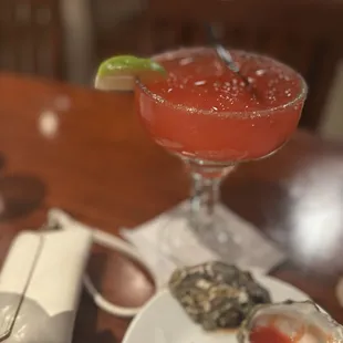 Margarita fresa y ostiones