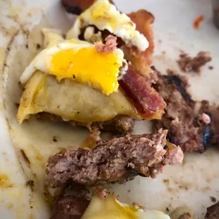 Sorry for the partially eaten photo, but this is the thickness of the burger. Dry and lacked much seasoning.