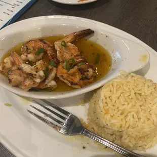 Grilled shrimp scampi and rice.