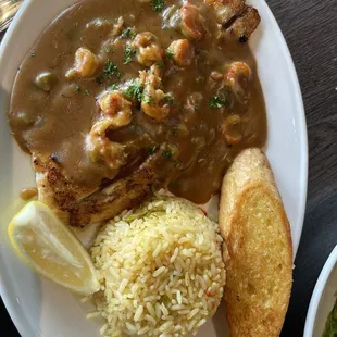 Red fish with crawfish etoufe