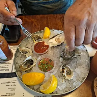 1/2 Dozen Oysters Goopy...look at my Brother&apos;s finger compared to the Oysters!!