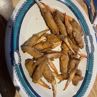 Non native, Asian blue crab claws from Pier 51. WHY??