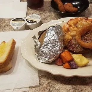 Sirloin and broiled shrimp, after my husband stole one of the shrimp!
