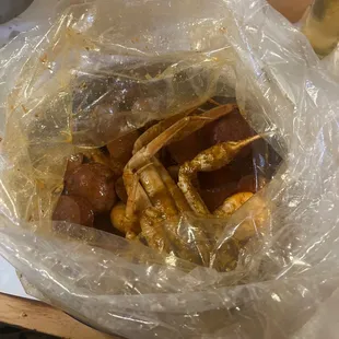 Snow crab shrimp potatoes yumm yumm sausage ! Killer enjoy