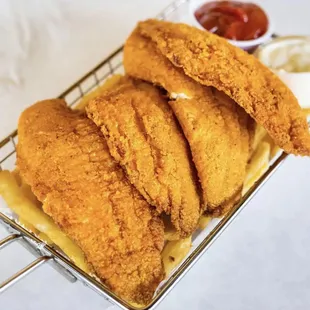 a basket of fried fish