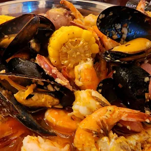 a plate of seafood and shrimp