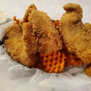 Tilapia basket with sweet potatoe waffle fries