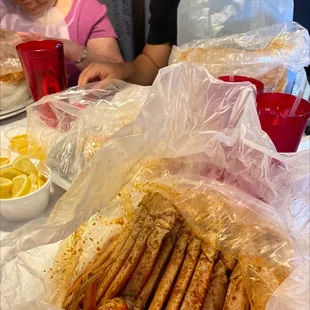 a woman and a child sitting at a table