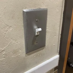 Dirty wall switch.   It's little, right?   What does the kitchen look like and where else do you cut corners if this is the presentation?