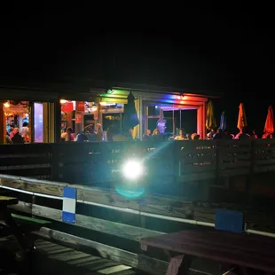 people sitting outside at night