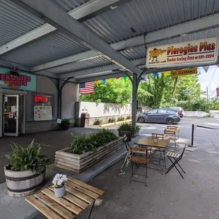 There&apos;s a small seating area under the roof/awning, but most people get their food to go.