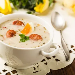 a bowl of soup with a spoon