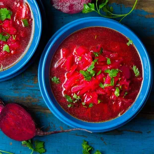 two bowls of beetroot soup