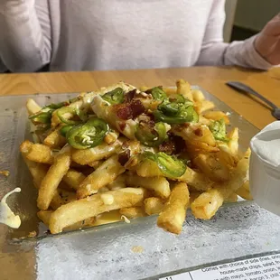 Fries with melted gouda, crisp bacon bits, agave and jalapeno