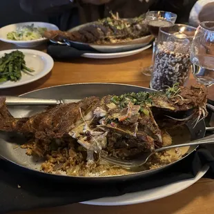Whole Red Snapper with Fried Rice and Haitian cream sauce. Yummy!