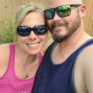 a man and woman taking a selfie