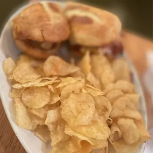 a plate of chips and a sandwich