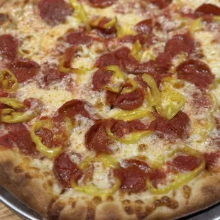 Small pepperoni pizza with the banana peppers.