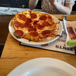 Kids menu pepperoni pizza.  $6.