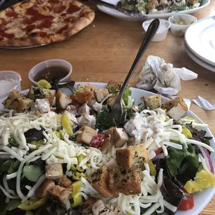House salad with chicken, and wife&apos;s pizza.