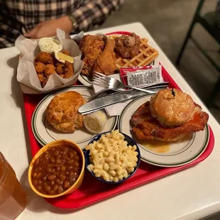 Mac 'n Cheese, Biscuit with Jelly &amp; Cream Cheese, chicken and Fried Chicken &amp; Waffles, Chicken Biscuit, Burnt End Baked Beans, Hush puppies