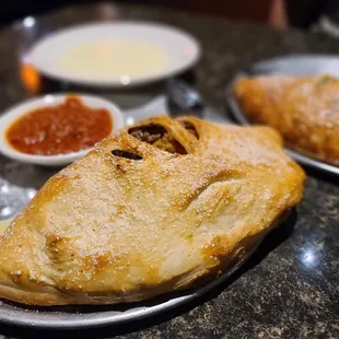 The Captain Calzone |  Piesanos Stone Fired Pizza