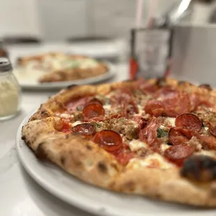 two plates of pizza