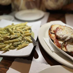 White pesto pasta and eggplant parm