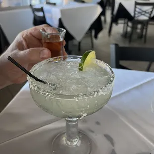  margarita in a glass with a lime wedge