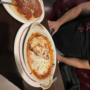 Parmigiana with a side of spaghetti