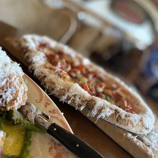 Artisan pizza  wood fired drizzled with sweet chili honey oil and Parmesan