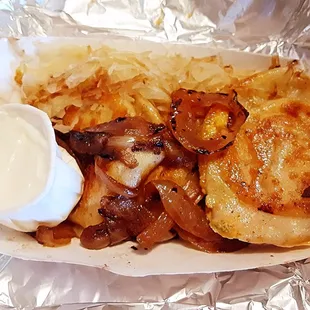 The Becky (4 pierogi&apos;s; jalapeno peppers, sour cream, cheddar cheese)