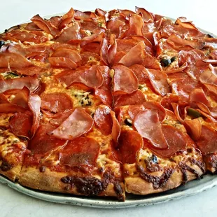 Pepperoni,  Canadian Bacon, Black Olive and Jalapeño