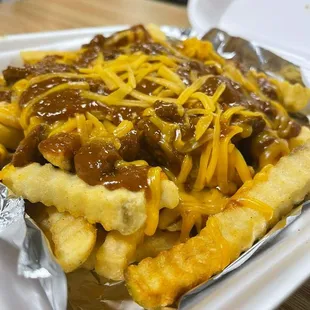 Chili  cheese fries. You can add pastrami too!
