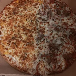 One half 5 cheese combo and the other half is all the meats