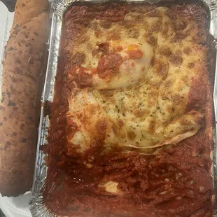undercooked Lasagna with Italian Sausage with no ricotta cheese, no italian sausage and no noodles just raw sauce