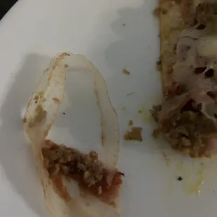 The plastic in the pizza was flavorless and tough to chew. Didn't even see it listed as a topping.