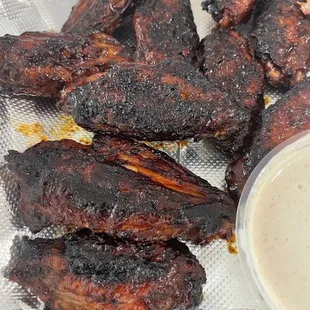 Burnt wings and no flavor.