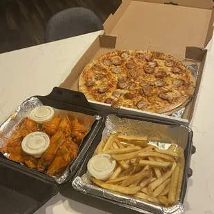 Pizza, wings, and fries