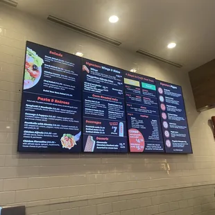 a menu on a wall in a restaurant