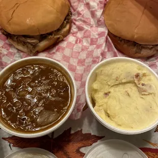 Pulled pork sandwiches, baked beans, potato salad.