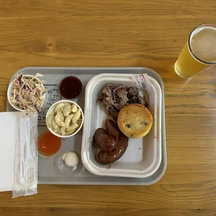 Coleslaw, Mac N Cheese , House Made Hotlinks, pulled pork, Cornbread , habanero sauce, and spicy sauce