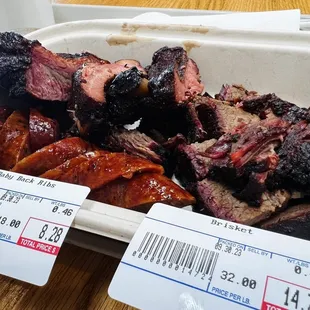 Beef Brisket - 1/2 lb. Baby Back Ribs - 1/2 lb. House Made Hotlinks