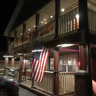 the outside of a motel at night