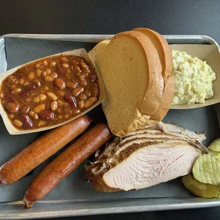 2 Meat Dinner - Jalapeño Sausage, Smoked Turkey, Baked Beans, Potato Salad, White Bread, Spicy Pickles.