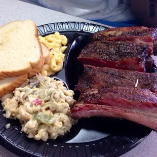 ribs w/ pasta salad, and macaroni and cheese