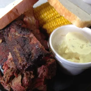 Ribs &amp; Brisket with potato salad and corn.