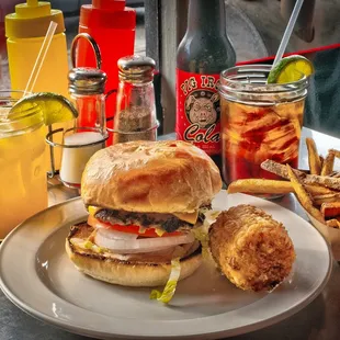 Deluxe Pork Burger, hand cut fries, Pig Iron Cola, Peach Margarita!