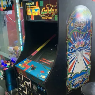 ows a pinball arcade machine