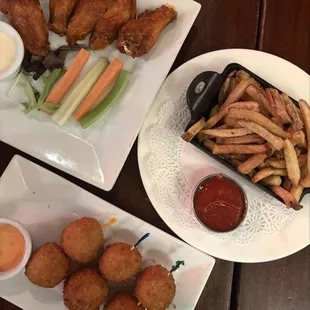 Buffalo Chicken Wings, Irish Mac n&apos; Cheese Bites, and side of Fries.